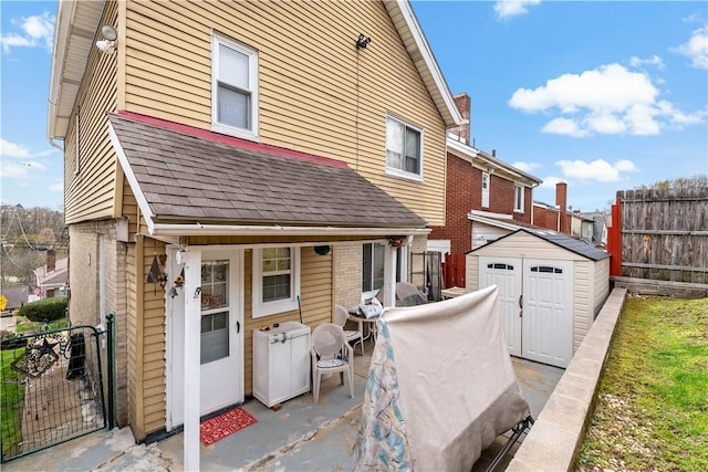 1405 Bellaire Pl, Brookline, PA 15226 - back of property with roof with shingles and brick siding