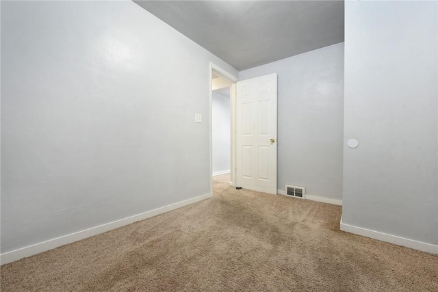 spare room with carpet flooring