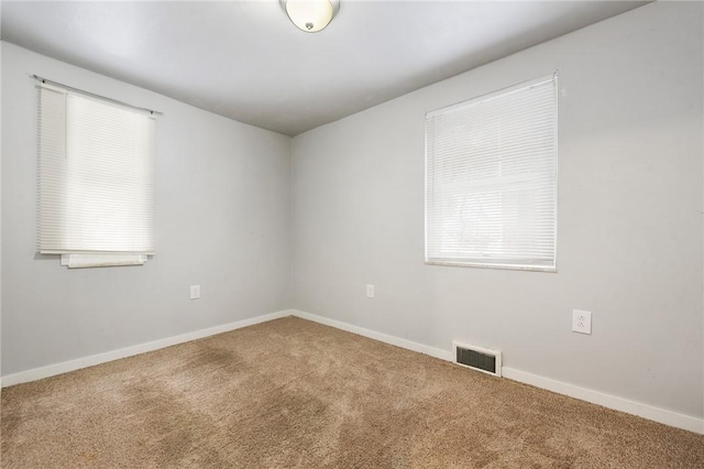 view of carpeted spare room