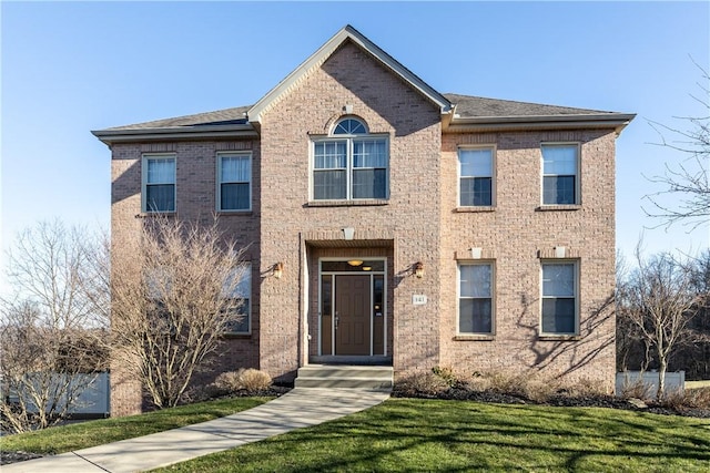 view of front of home with a front lawn