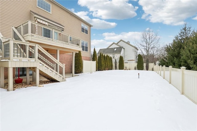 view of yard covered in snow