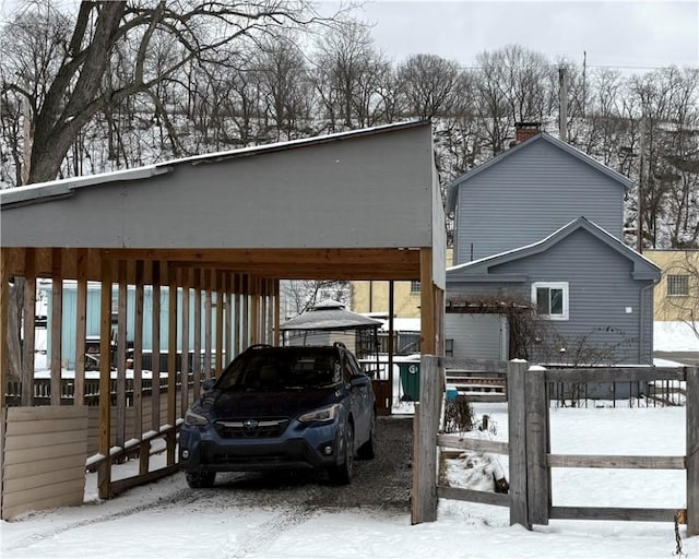 exterior space with a carport