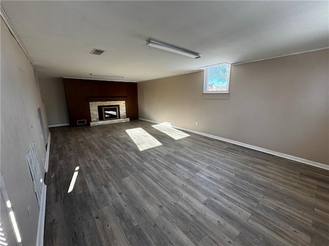 unfurnished living room with wood-type flooring