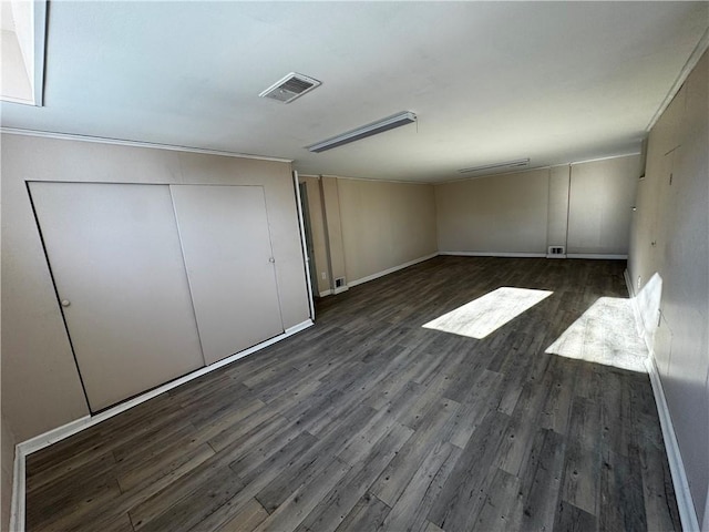 interior space with dark hardwood / wood-style floors