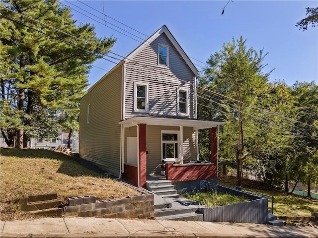 view of front of house featuring covered porch