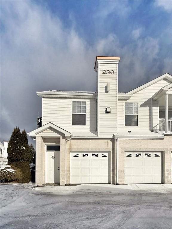 view of front of home with a garage