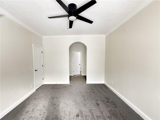 carpeted empty room with crown molding and ceiling fan