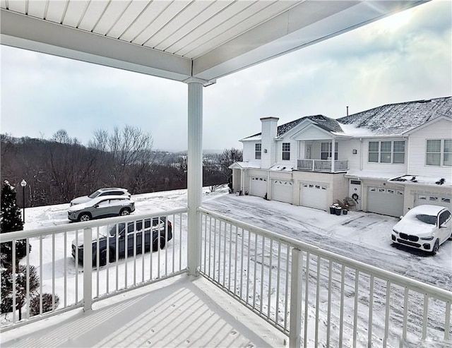 view of snow covered deck