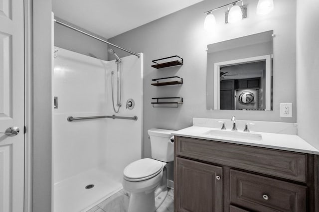 bathroom with vanity, toilet, and walk in shower