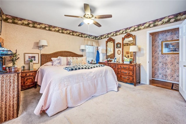 carpeted bedroom with ceiling fan