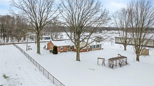 view of yard covered in snow