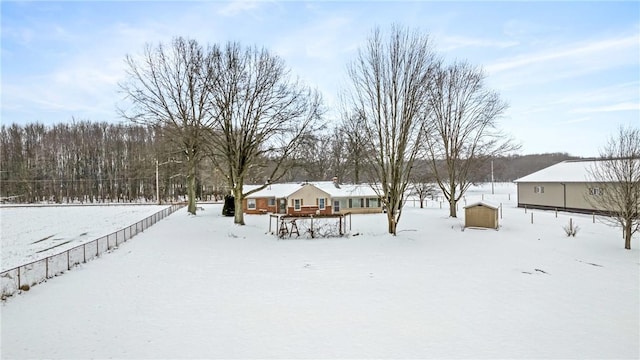 view of yard layered in snow