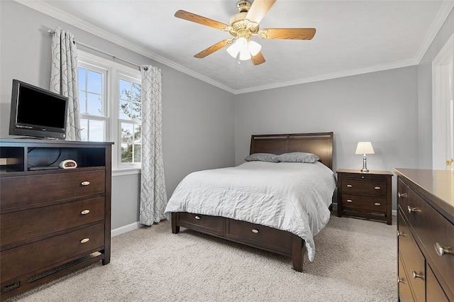 bedroom with ceiling fan, light colored carpet, and crown molding