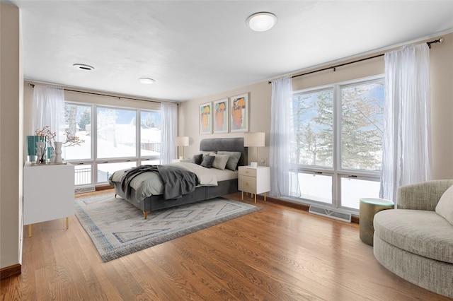 bedroom featuring light hardwood / wood-style flooring