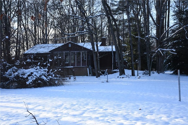 view of yard covered in snow