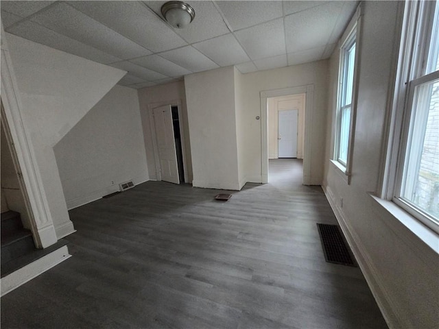 bonus room with dark hardwood / wood-style flooring