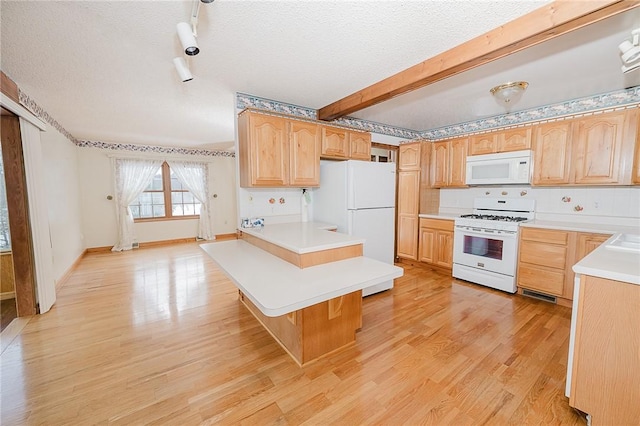 kitchen with light wood-type flooring, beam ceiling, white appliances, and a textured ceiling