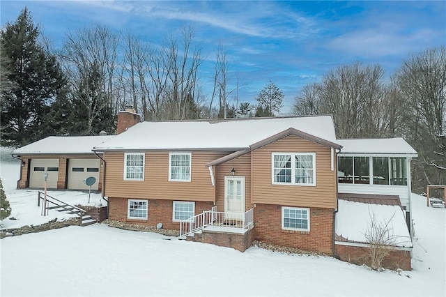 view of snow covered house