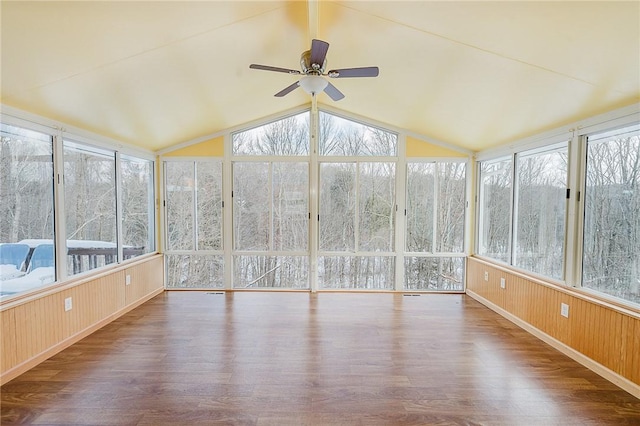 unfurnished sunroom featuring ceiling fan and vaulted ceiling