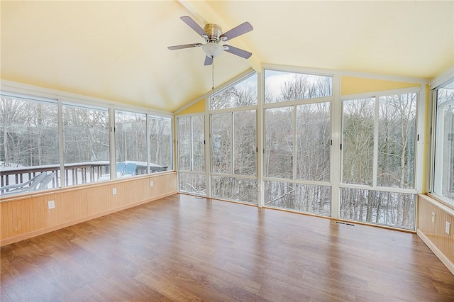 unfurnished sunroom featuring vaulted ceiling with beams and ceiling fan