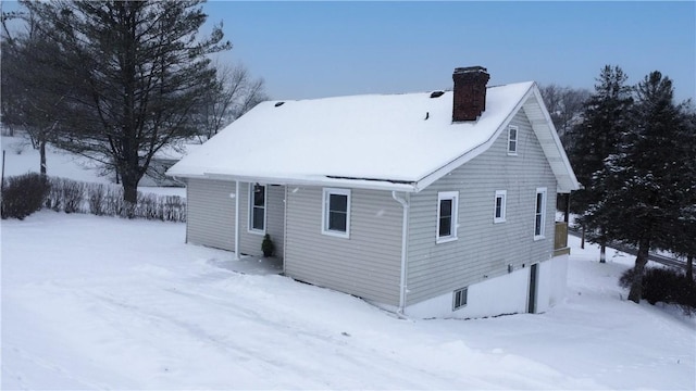 view of snow covered property