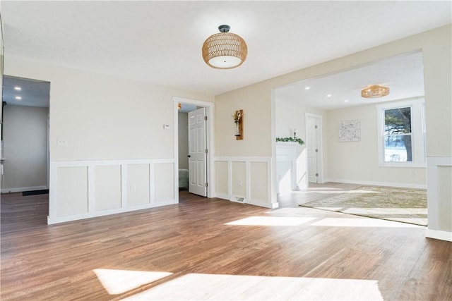 spare room featuring light hardwood / wood-style floors