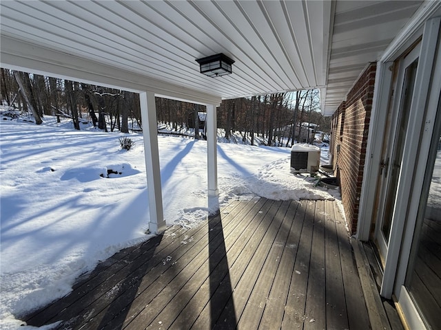 snow covered deck with central AC