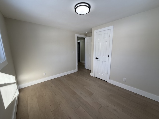 unfurnished room featuring light hardwood / wood-style flooring