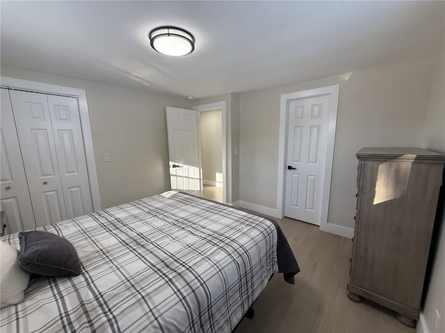 bedroom with light wood-type flooring