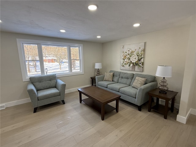 living room with light hardwood / wood-style floors