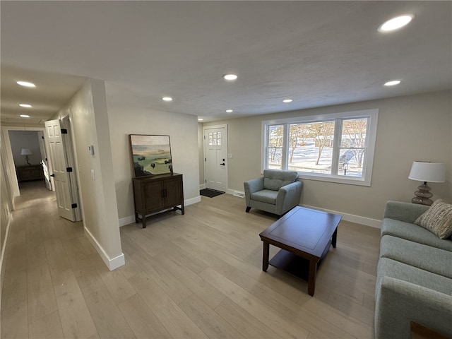 living room with light hardwood / wood-style floors