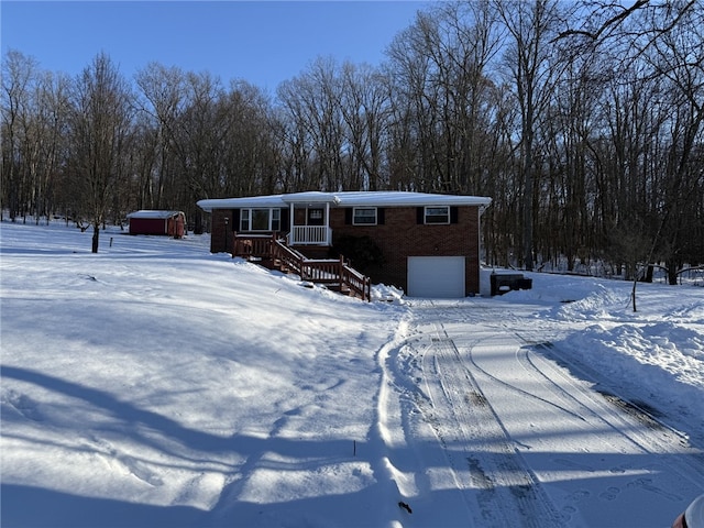 view of front of home featuring a hot tub and a garage