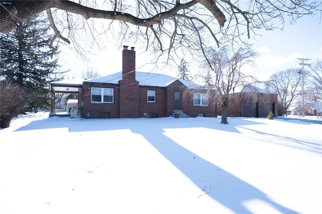 view of snow covered property