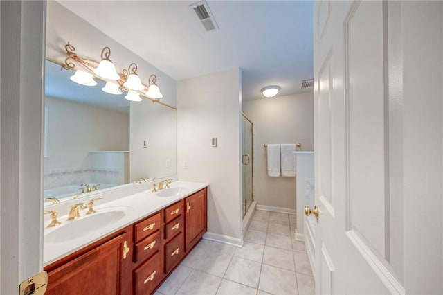 bathroom featuring tile patterned flooring, vanity, and independent shower and bath