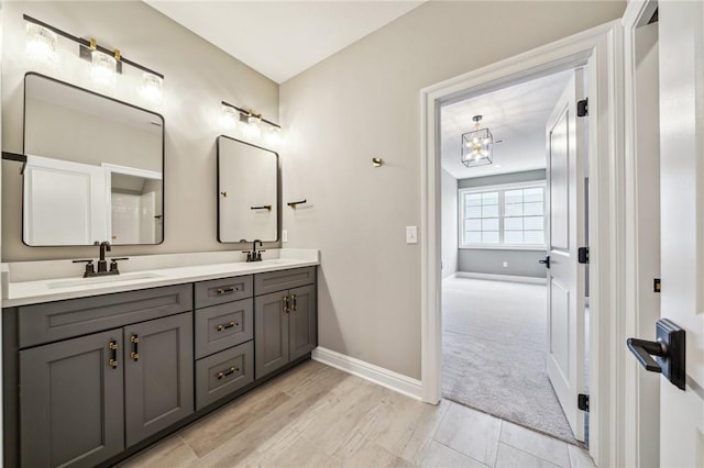 bathroom featuring hardwood / wood-style floors and vanity