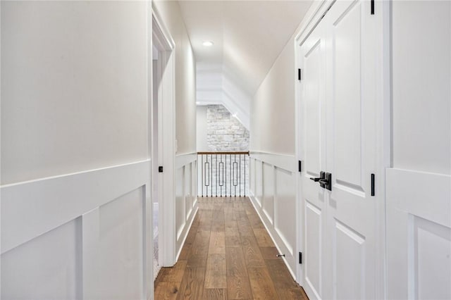 hallway with dark hardwood / wood-style floors