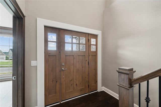 entryway featuring dark wood-type flooring