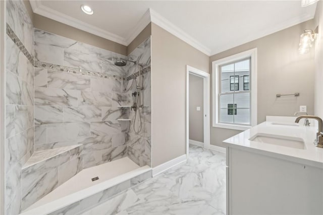 bathroom with a tile shower, vanity, and ornamental molding