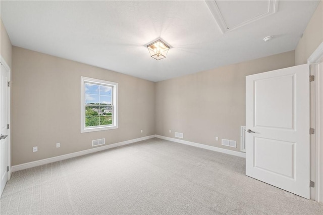 view of carpeted spare room