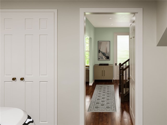 hall with dark hardwood / wood-style floors