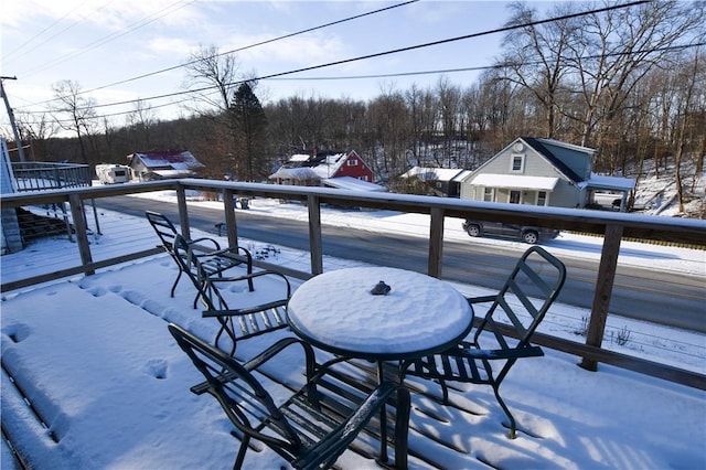 view of snow covered deck