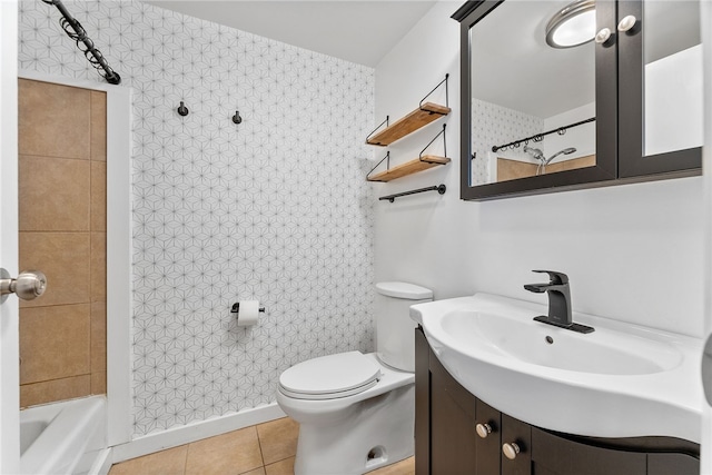 bathroom featuring tile patterned flooring, vanity, and toilet