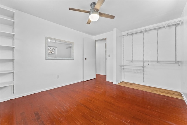 spare room with ceiling fan and hardwood / wood-style floors