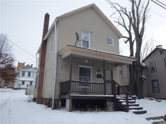 view of property with covered porch