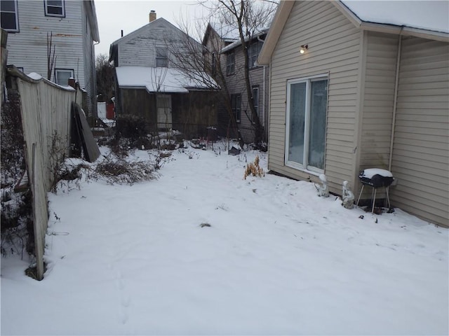 view of yard covered in snow