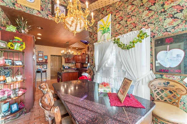 dining area featuring a chandelier