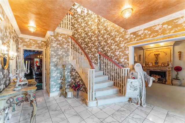 stairs with crown molding