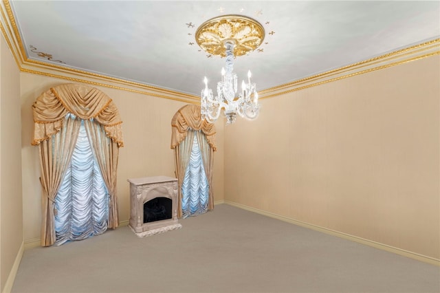 unfurnished living room featuring carpet flooring, a chandelier, and ornamental molding