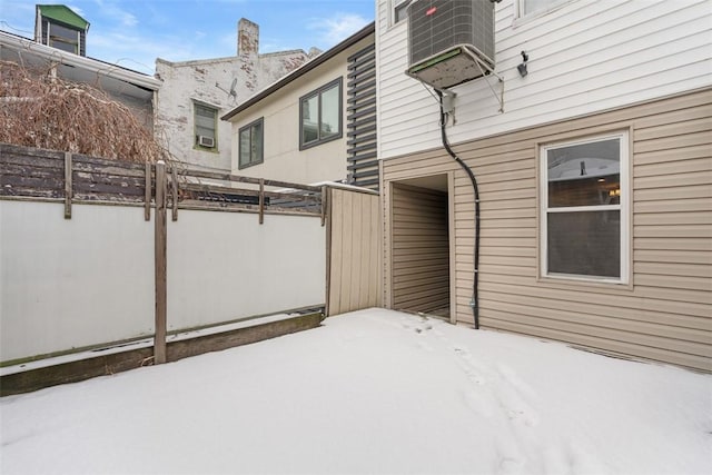 view of snow covered patio