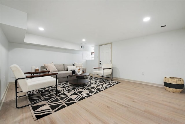 living room with hardwood / wood-style floors